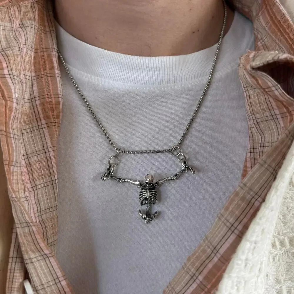Silver skeleton necklace on a